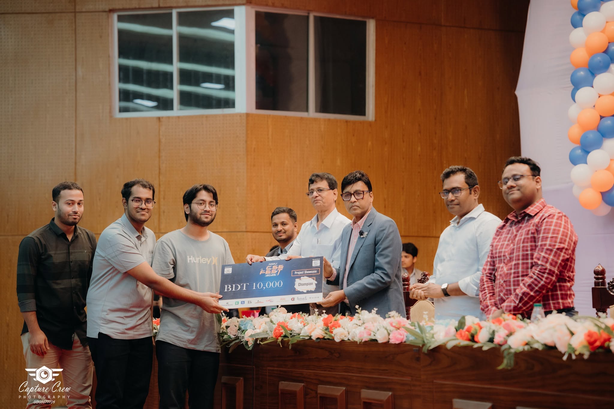 Team NiramoyAI receiving the champion prize at the NWU project showcase